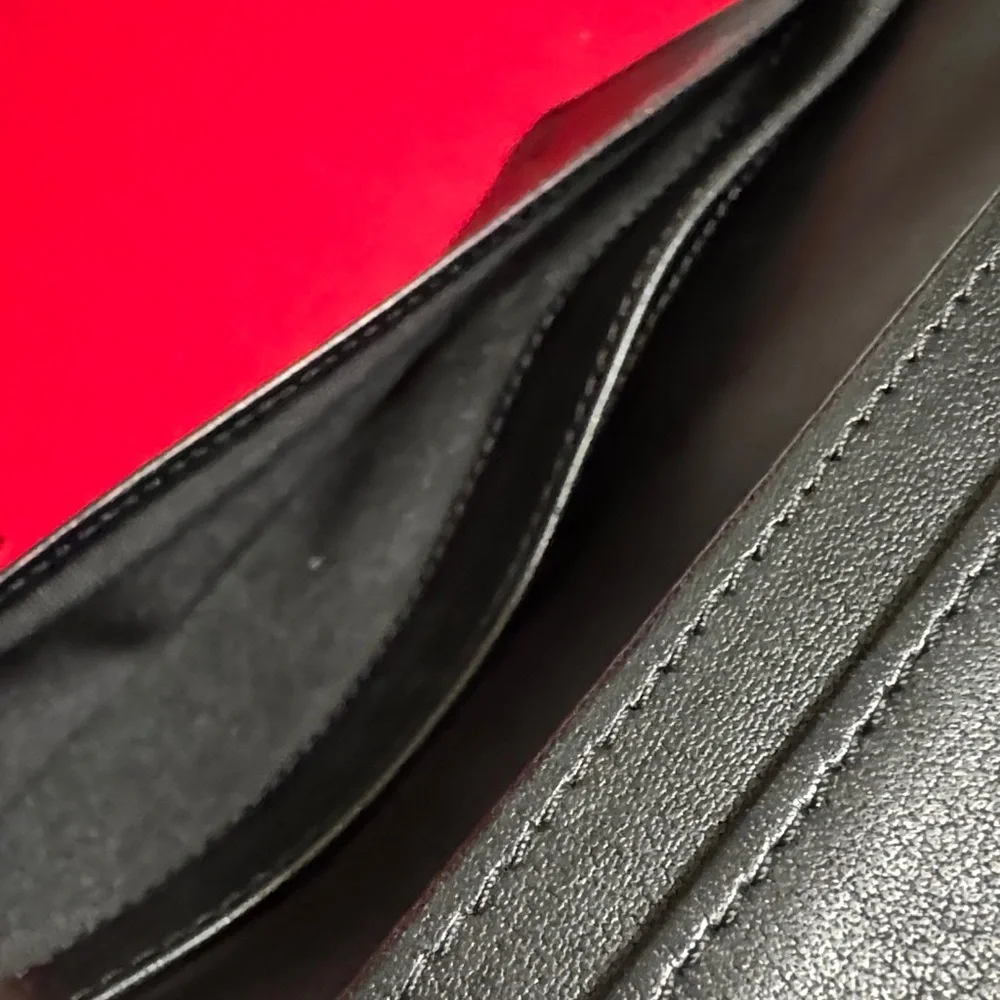 CHANEL Black Leather Wallet with Silver Logo